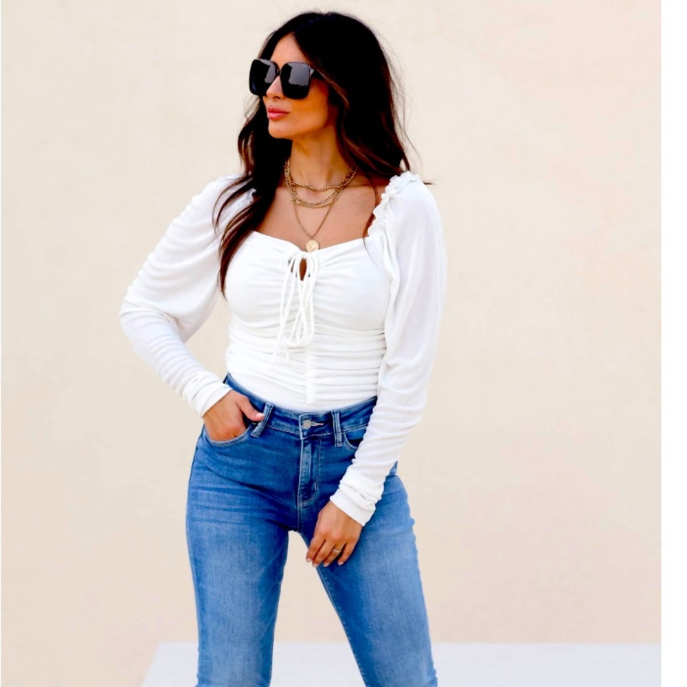 Size Med White Bodysuit. Brand new